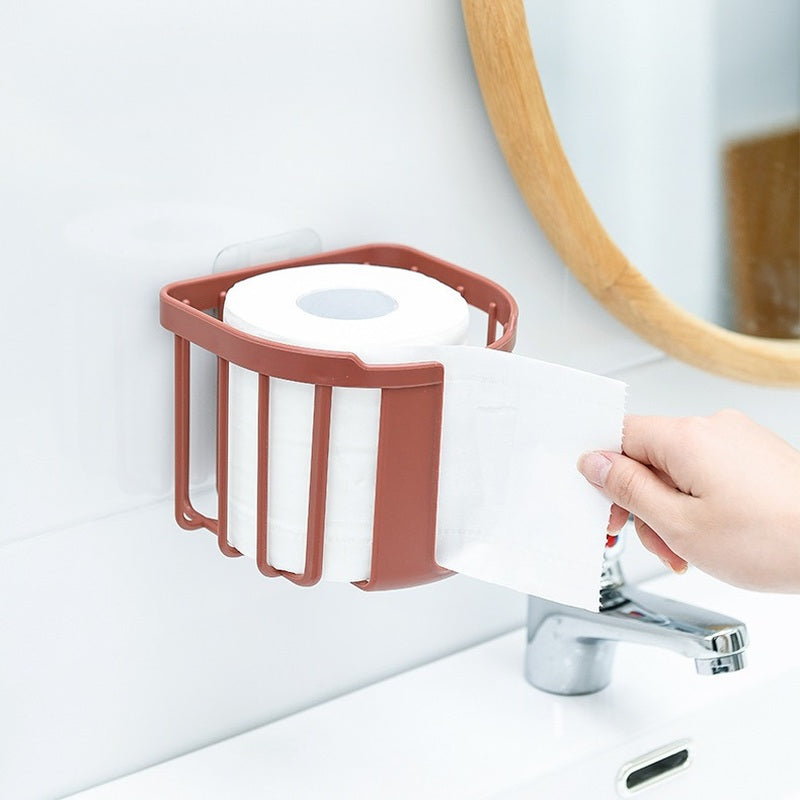 Hanging bathroom tissue holder